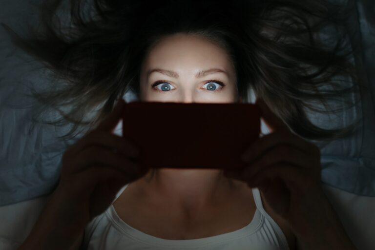 Girl-staring-at-phone-scaled